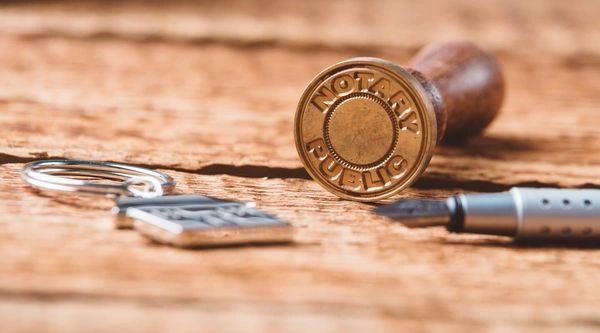 Notary public stamp on a desk